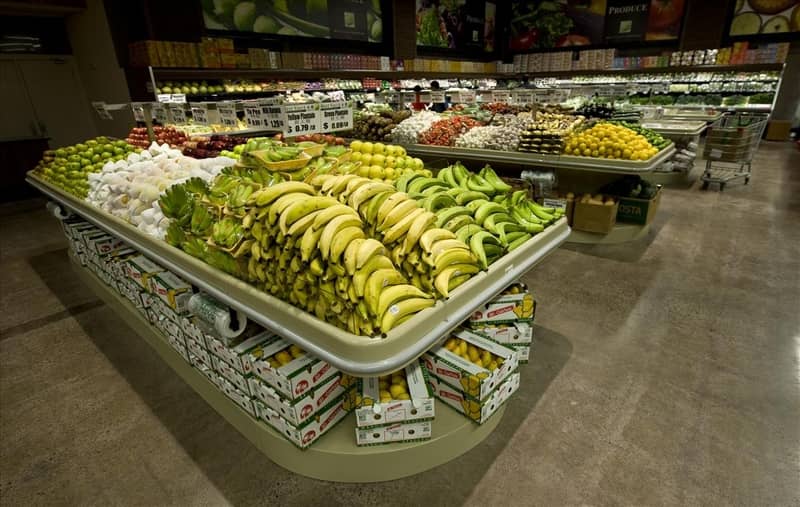 banana produce table displays with bottom storage in BEST VALUE FOODMART Ontario Corner